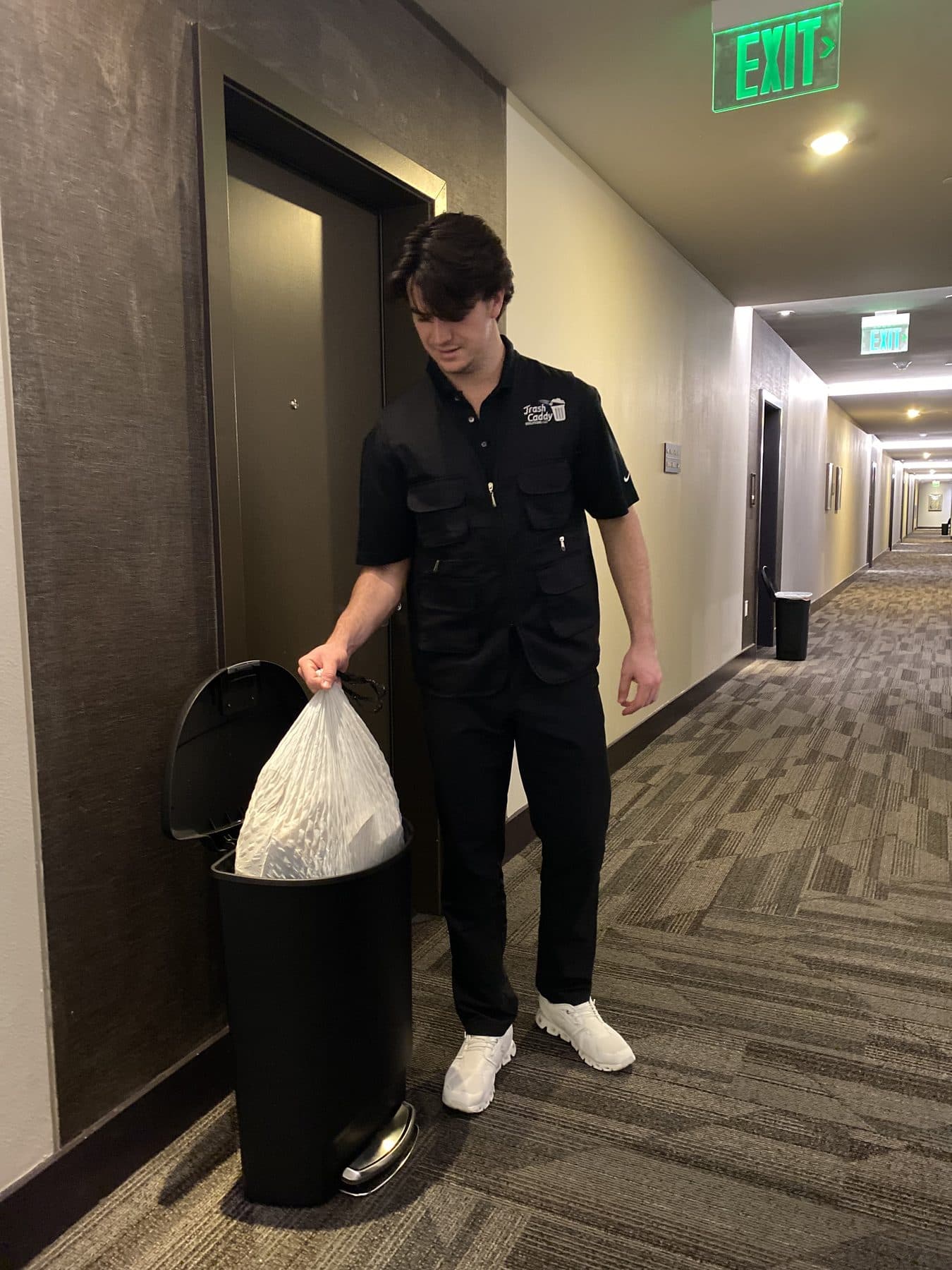 A Trash Caddy Solutions team member on property